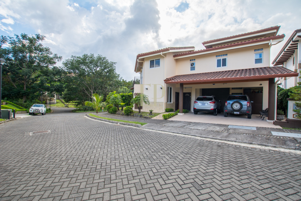 Two story home with garden and views in private residential Two story home with garden and views in private residential