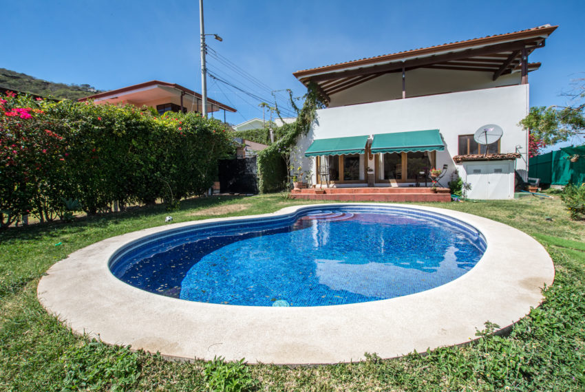 For sale beautiful home with private pool in gated condominium with 24/7 security.